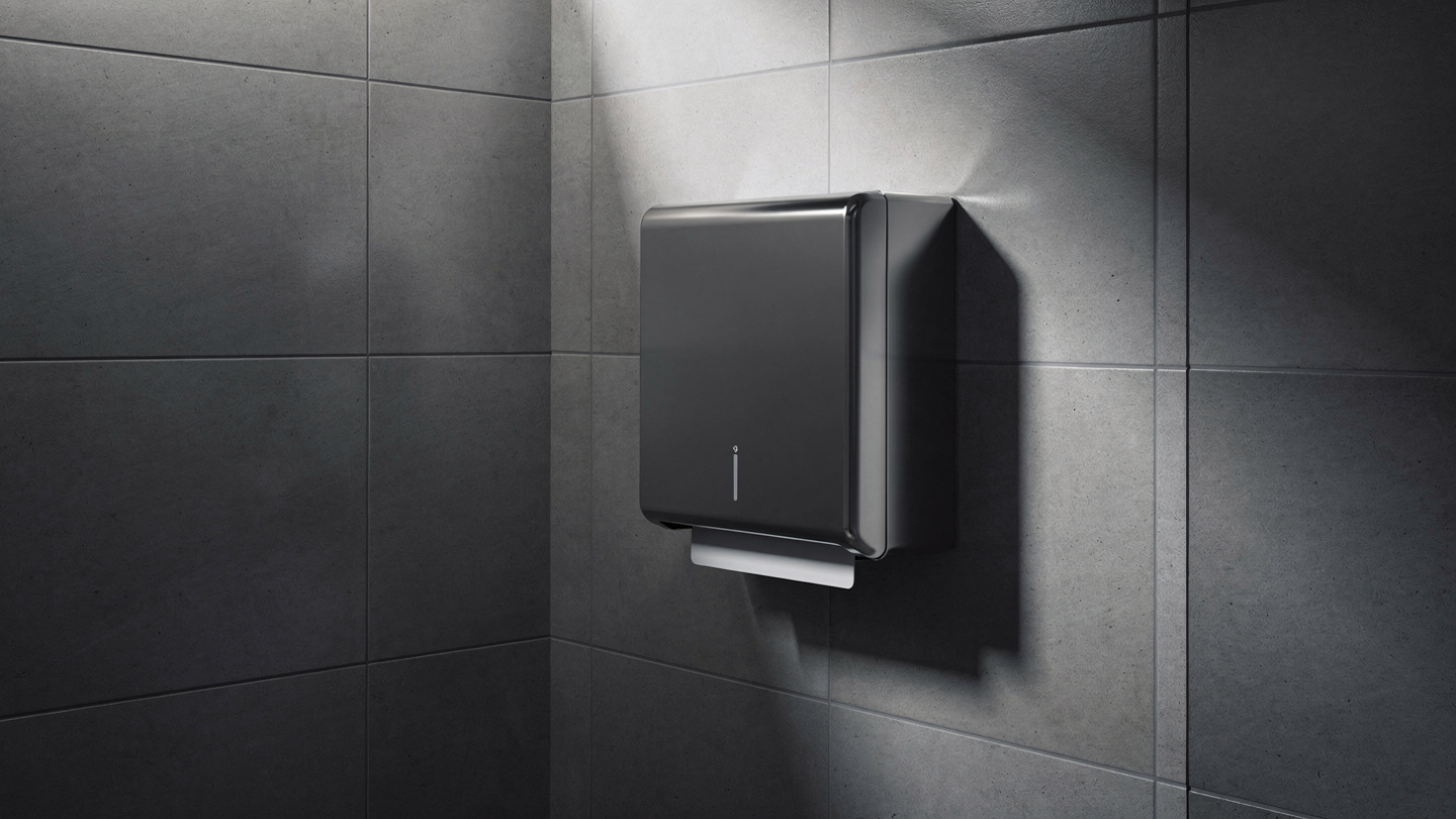quiet compact hand dryer in office bathroom